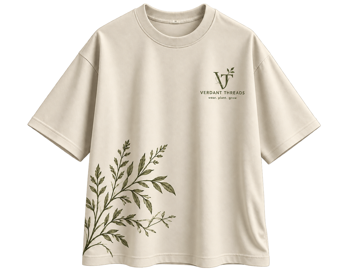 Canopy Tee — cream shirt with a small Verdant Threads logo and botanical branches emerging from the lower corner